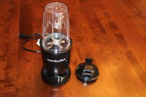 lot 116 image: Nutribullet Blender with Blade Assembly and Cap