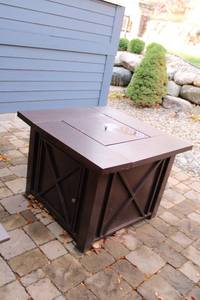 lot A-134 image: Gas Fire Pit Table with Hidden Propane Compartment - Decorative Brown Finish