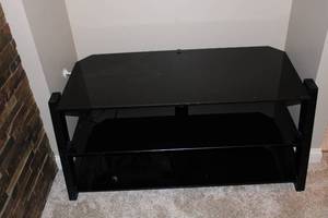 lot 137 image: Black Glass TV Stand - 48x22 inches