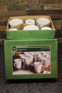 lot 168 image: Set of 12 Unopened Holiday Time Porcelain Mugs - White with Silver Band