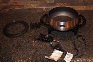 lot 210 image: Oster Electric Fondue Set with 6 Forks and Instruction Manual