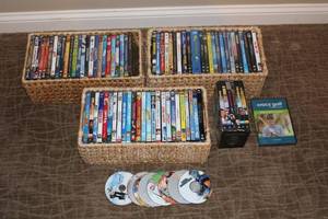 lot E-221 image: Collection of 35 DVD Movies and Video Games - Family Classics and More