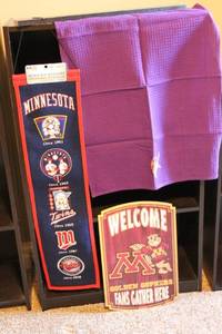 lot 225 image: Collection of 3 Minnesota Sports Items - Welcome Sign, Twins Banner, Vikings Towel