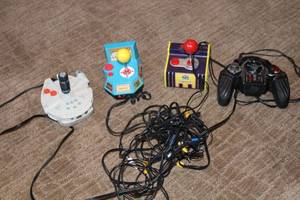 lot E-250 image: Lot of 4 Retro Video Game Controllers - Star Wars, Pac-Man and More