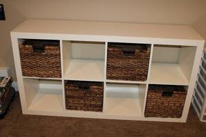 lot A-259 image: Modern White Storage Unit with 4 Woven Baskets