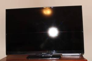 lot E-285 image: Sharp 55-Inch LED TV Model E42D41NKEGBSMNX with Remote