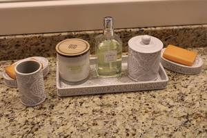 lot 294 image: Bathroom Accessories Set with Soap Dish, Candle, and Dispenser