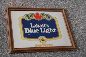 lot W-295 image: Framed Labatts Blue Light Beer Advertising Sign