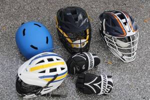 lot 308 image: Lot of 4 Lacrosse Helmets and Pair of Gloves