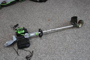 lot B-311 image: EGO Power 56V Cordless String Trimmer with Battery and Charger