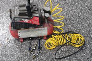 lot T-324 image: Used Quiet Air Compressor with Accessories and Hose