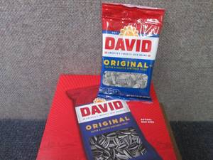 lot 242 image: 24- 1.75 oz David Original Salted &...