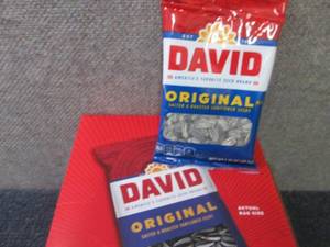 lot 243 image: 24- 1.75 oz David Original Salted &...