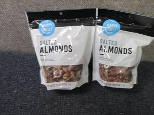 lot 312 image: 2- 16 oz Happy Belly Salted Almonds...