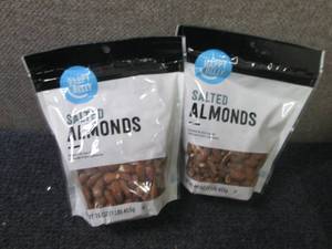 lot 353 image: 2- 16 oz Happy Belly Salted Almonds...