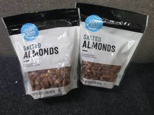 lot 354 image: 2- 16 oz Happy Belly Salted Almonds...