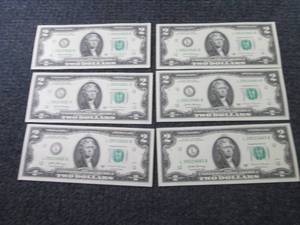 lot 447 image: 6 Sequential, Uncirculated $2 Bills...