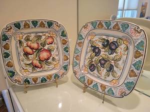 lot 10 image: A pair of Majolica Faience Chargers signed Lotti. And a Deruta Pitcher.