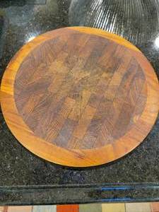lot 34 image: A Dansk Cutting Board .  12 across.