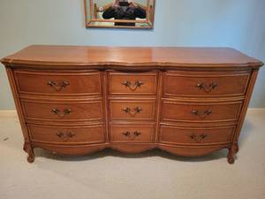 lot 59 image: Curved Front Dresser by Dixie Furniture.