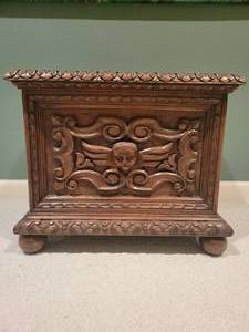 lot 70 image: Antique Winged Angel Carved Storage Box. Red Lined.