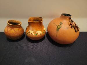 lot 105 image: Two Southwest Ceramic Pots and a Native Style Painted Gourd.