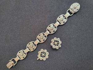lot 111 image: A Danish Sterling Bracelet set with Pin and Pendant by Julius Klagenborg.