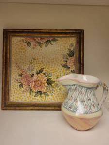 lot 151 image: A Mackenzie Childs Framed Tile and Pitcher.