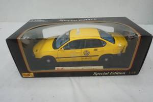 lot 22 image: Miasto Chevrolet Impala yellow cab model