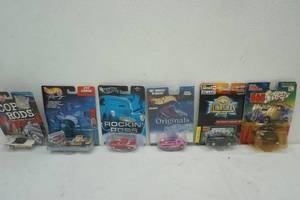 lot 328 image: 6ct variety Revell, Hot Wheels, Racing Champions