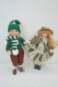 lot 394 image: 2 porcelain dolls with stands