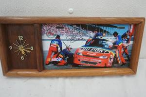 lot 443 image: Racing Reflections clock