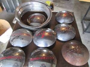 2 full sets of Vintage hub caps Mer...