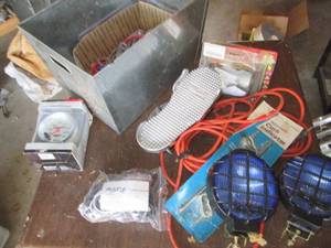 Metal bin with a variety of automot...