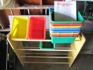 Wood framed shelving unit with asso...