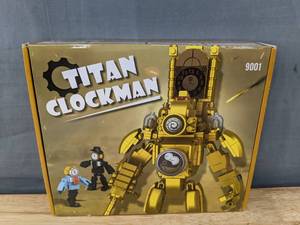 lot 180 image: Brand New Titan Clockman Figurine L
