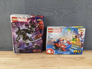lot 32A image: Brand New Lego Marvel Venom Mech Armor vs. Miles Morales and LEGO Marvel Spider-Mans Car and Doc Ock Building Set Z