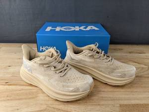 lot 16L image: Brand New Hoka Clifton 9 Shoes Womens Size 8.5 Tan Sand Sneakers Mens Size 7 $145 Retail L
