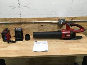 lot 12 image: Toro 60V Cordless Blower with 4Ah Battery and Charger Model # 51822