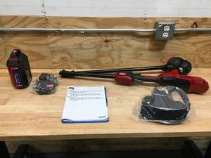 lot 13 image: Toro 60V Cordless String Trimmer With 2 Ah Battery and Charger Model # 51831