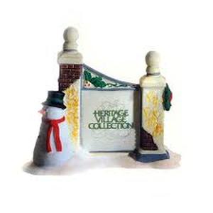 lot 92 image: Dept 56 - Dickens Village Collections Village Sign with Snowman - Heritage Village Collection