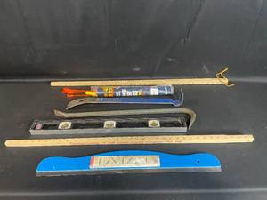 lot 49 image: Lot of 5 Assorted Hand Tools Including Level, Pry Bars, and Measuring Tape