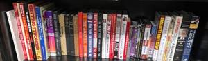 lot 77 image: Collection of 25 Assorted Books and DVDs
