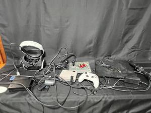 lot 87 image: Lot of Vintage Gaming Consoles and Accessories - NES, Xbox Controller, VR Headset