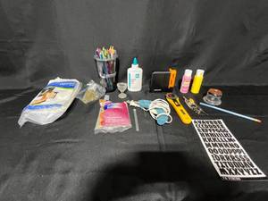 lot 193 image: Assorted Craft Supplies including Glue, Glitter, and Tools