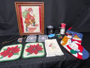 lot 194 image: Vintage Holiday Decor Set with Framed Santa Art, Potholders, Christmas Stocking, and More