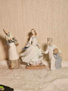 lot 53 image: Flawless Lladro Porcelain Figurines  Boy in Night Shirt  Shepherdess with Dog  Girl with Lost Slipper