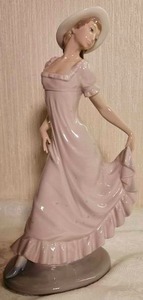 lot 54 image: NOA by Lladro Women in a Long Pink Dress