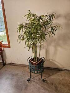 lot 91 image: Footed Iron Basket Planter