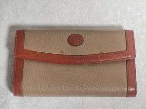 lot 104 image: Dooney & Bourke Fine Leather Wallet